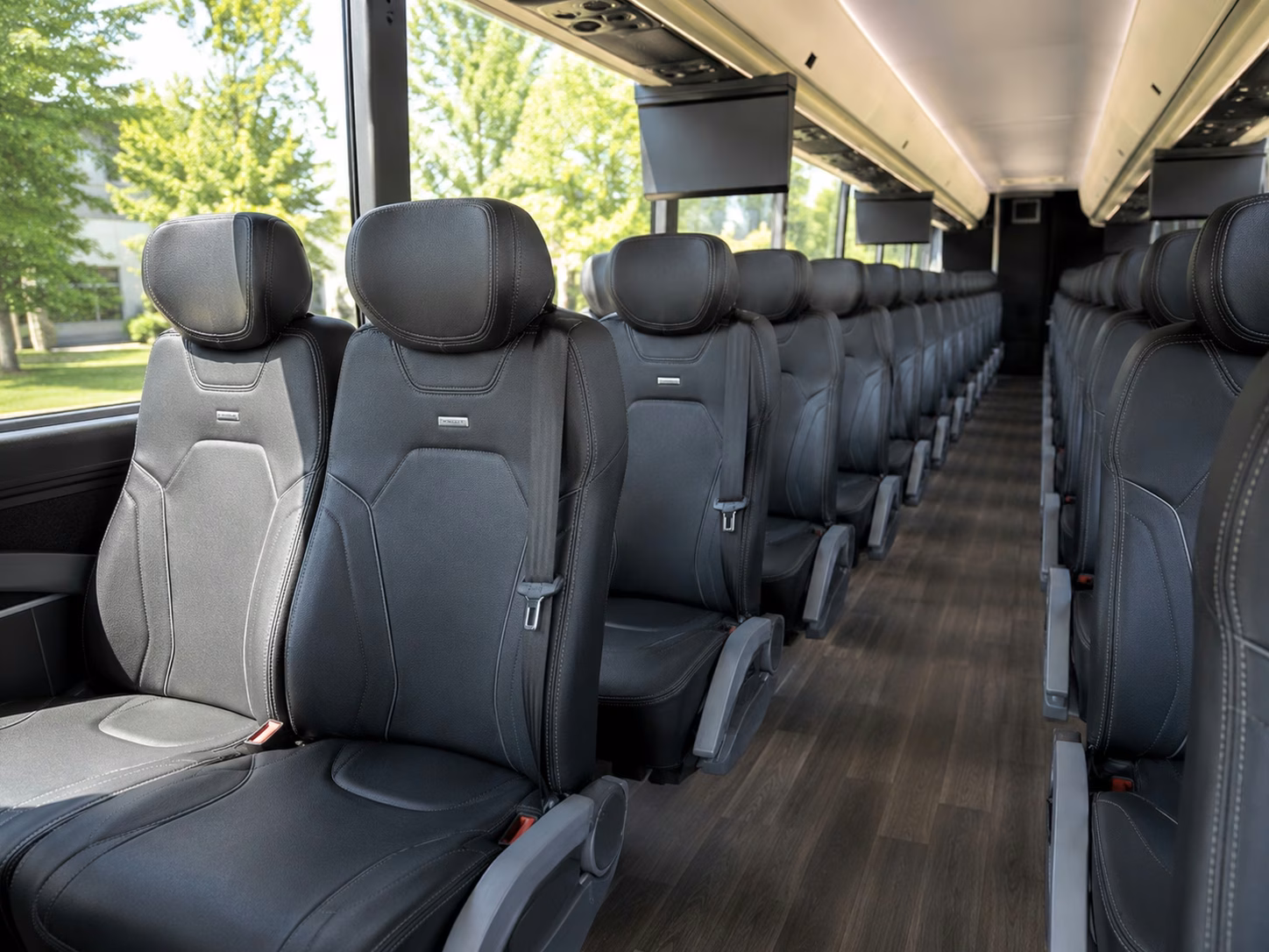 how the time of year and peak seasons affect charter bus rental prices in johns creek